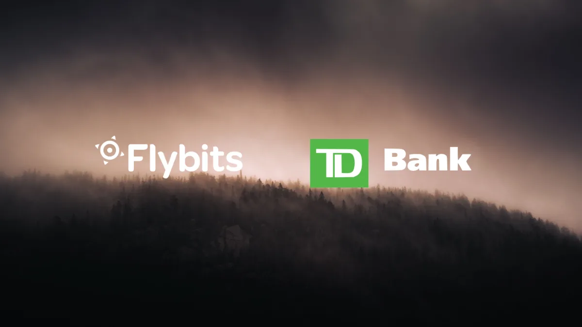 Flybits and TD Bank logos over a misty forest ridge